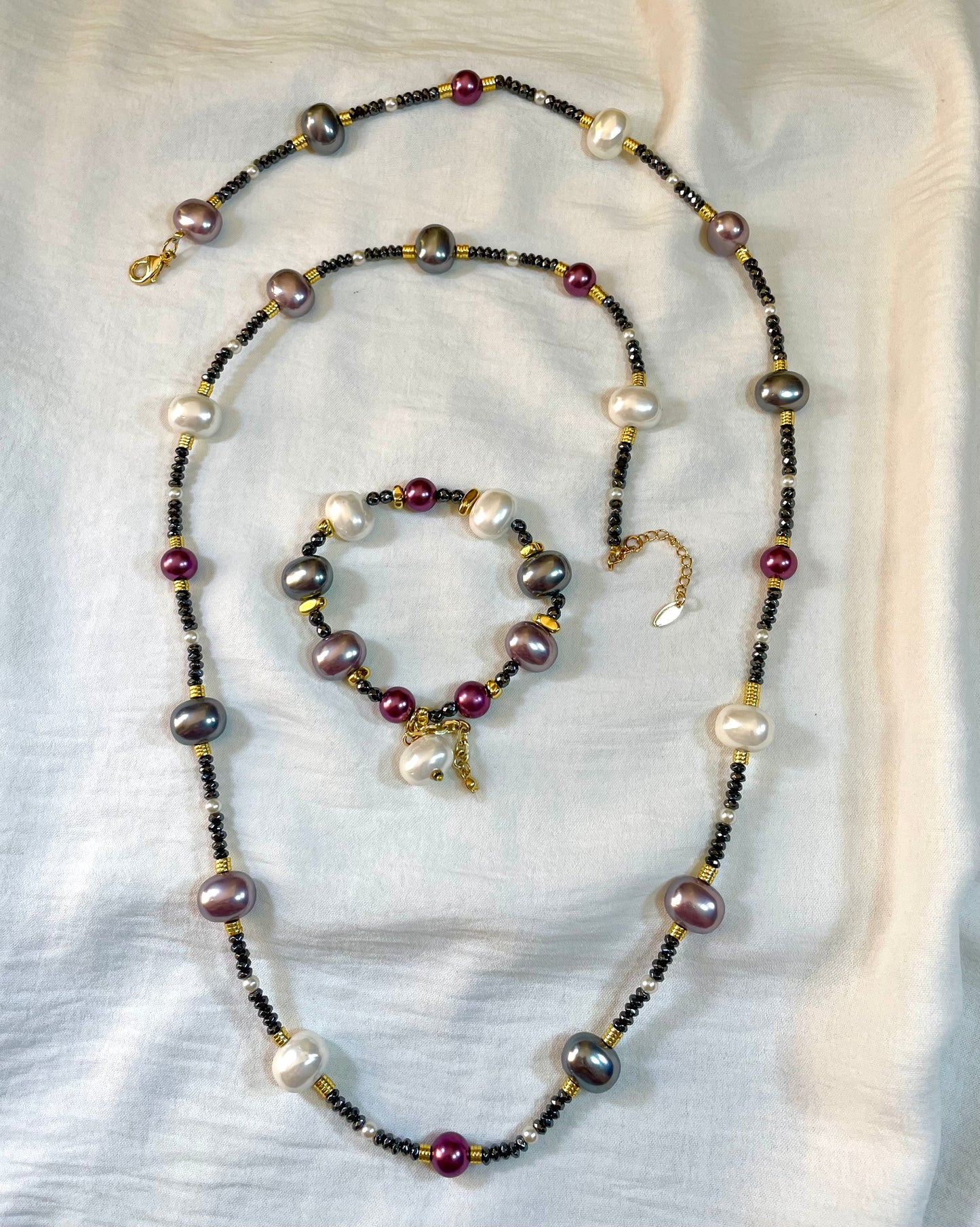 A Necklace And Bracelet Set