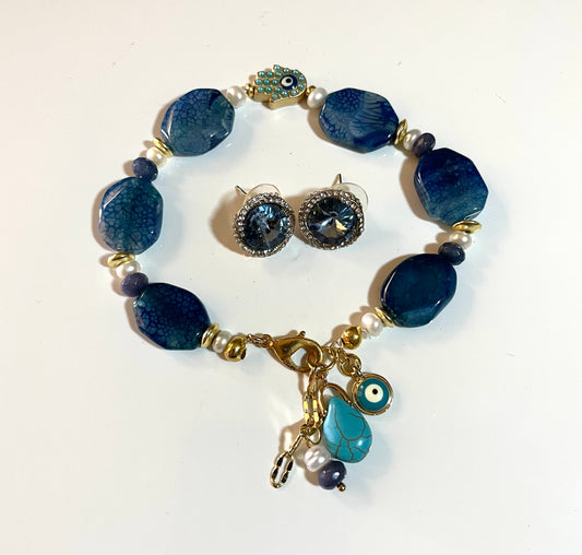 A Bracelet And Earrings Set