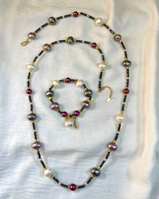 A Necklace And Bracelet Set